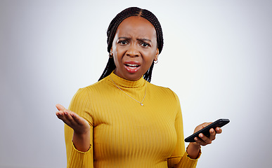 Image showing Phone text, black woman and confused portrait from scam conversation and anxiety from problem and fail. Studio, white background and frustrated female person with spam communication and mistake
