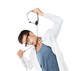 Image showing Work, suicide and man at call center with headset pretend to suffocate, choke or strangle neck with cord. Mental health, crisis and depressed businessman hanging with headphones in customer service