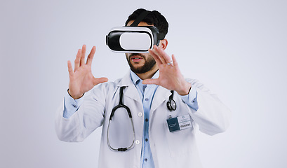 Image showing Doctor, vision and virtual reality glasses for medical software, metaverse, futuristic technology and digital experience in studio. Healthcare man with 3d exam, hands and VR on a white background