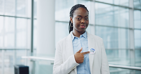 Image showing Woman, portrait and badge for vote, pointing and confidence or button, proud and choice in politics. Black person, pin and support for elections, democracy and party in registration for human rights