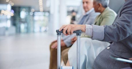 Image showing Hand, suitcase and a business person in the airport for travel, waiting to board his international flight. Corporate, luggage and a professional employee in a terminal or lobby for a global trip