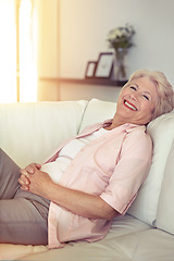 Image showing Portrait, smile and senior woman on a couch, relax and happiness at home, calm and peaceful. Face, mature happy female person and elderly lady on a sofa, chilling and retirement with weekend break