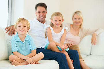 Image showing The perfect family portrait. Portrait of a loving family of four spending time together.