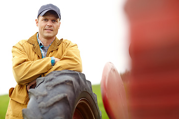 Image showing Ive been on this farm my whole life. Portrait of a farmer standing outside beside blurred copyspace.