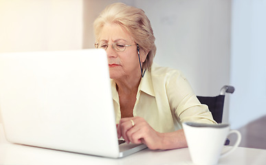 Image showing Shes one tech-savvy old lady. a senior woman using her laptop at home.