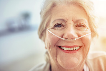 Image showing Portrait, healthcare and recovery with a senior woman in her home after treatment at a hospital or clinic. Face, smile and medical tubes with a happy mature female patient looking healthy closeup