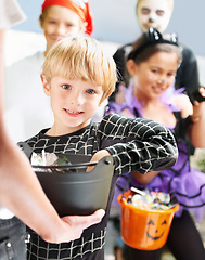 Image showing We couldnt be any happier. Portrait of happy little children trick-or-treating on halloween.