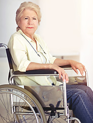 Image showing Aging is not a walk in the park. Portrait of a senior woman in her wheelchair at home.