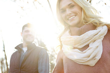 Image showing Taking a walk in the woods. A happy and loving couple spending time out in the woods together.