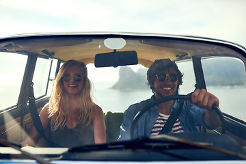 Image showing Hitting the open road. an affectionate young couple taking a roadtrip together.