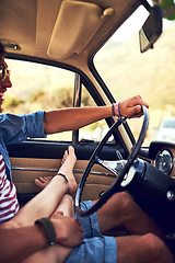 Image showing Travelling comfortably. an affectionate young couple taking a roadtrip together.