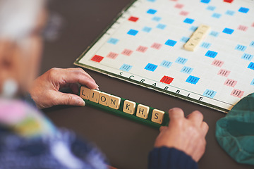 Image showing Spell Winning. seniors playing a boardgame.