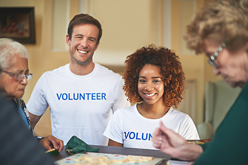 Image showing Making a difference. Portrait of volunteers working with seniors at a retirement home.