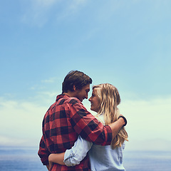 Image showing Theres no place Id rather be. an affectionate young couple enjoying a hike in the mountains.