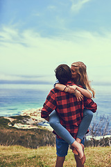 Image showing They found love and theyre not letting go. an affectionate young couple enjoying a hike in the mountains.