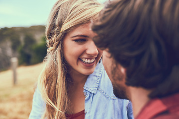 Image showing Hes lost in those eyes. an affectionate young couple enjoying a hike in the mountains.