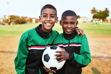 Image showing Theyre the best players on the field. Portrait of two young boys playing soccer on a sports field.