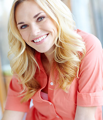 Image showing Bright smile. Portrait of a beautiful young woman smiling and feeling cheerful at home.