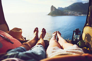 Image showing Getting out of the city. an unidentifiable young couple relaxing inside their car during a roadtrip.