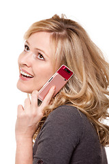 Image showing Smiling woman on cell phone