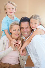 Image showing Delighted to be together. Two delighted parents spending time with their cute children.