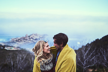 Image showing Youre the most beautiful view out here. an affectionate young couple enjoying a hike in the mountains.