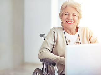 Image showing Young at heart... slightly older in other places. a senior woman using a laptop while sitting in a wheelchair.
