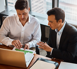 Image showing You can have whatever you work for. two businessmen having a discussion while sitting by a laptop.