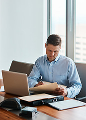 Image showing Ill just sign and send it back through e-mail. a mature businessman working at his desk.