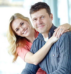 Image showing Sharing a special bond. Portrait of an affectionate and happy mature couple spending time together while relaxing at home.