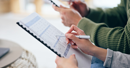 Image showing Closeup, couple and hand with clipboard for financial planning, budget or savings in home. Woman, pen or paperwork for checking by spouse for calculation of money for future, investment or growth