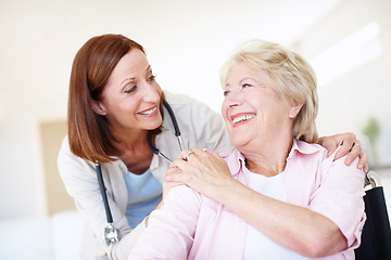 Image showing Words cant express how much your care has meant to me. Mature nurse and her elderly patient share an affectionate moment together.