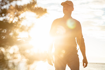 Image showing Theres something new around every corner. a man out for a hike on a coastal trail.