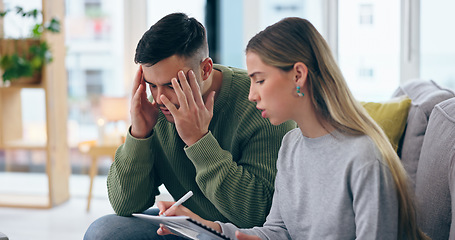 Image showing Home, stress and couple with documents, finance and budget with taxes, debt and asset management in a lounge. Apartment, man or woman with paperwork, bills or payment discussion with mortgage or rent