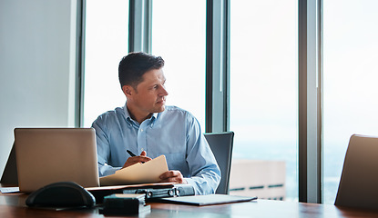 Image showing You have the power to make your dreams come true. a mature businessman working at his desk.