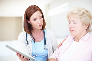 Image showing Care, comfort and attention. Elderly patient receives some comfort from her nurse after receiving a bad diagnosis.