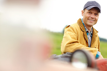 Image showing Hes confident in his ability to farm. Portrait of a farmer standing outside beside blurred copyspace.