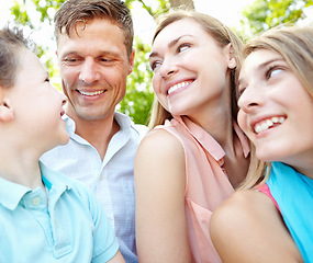 Image showing Family afternoon in the park. Happy family smiling while outdoors.