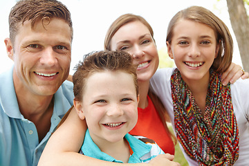 Image showing Spending some quality time together. Portrait of a happy family enjoying a day out together.