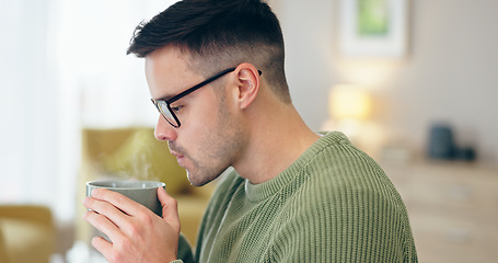 Image showing Closeup, man and drinking of coffee in home for relaxing, comfort or delicious taste in morning. Person, male entrepreneur and glasses for remote work with steam for espresso, latte or cappuccino