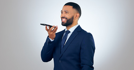 Image showing Phone call, voice note and business man in studio for internet, speaker and social media. Corporate, professional and person on smartphone for communication, talking and networking on gray background