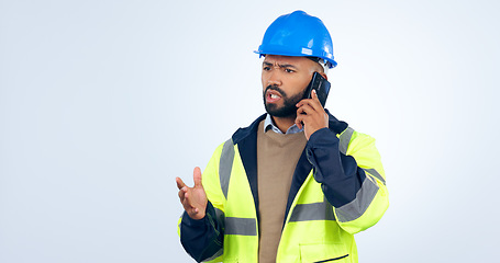 Image showing Frustrated man, architect and phone call for construction or discussion against a studio white background. Serious male person, contractor or engineer talking on mobile smartphone in conversation