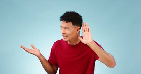 Image showing Gossip, news of portrait of man listening in studio or blue background with information or questions. Hearing, story or confused person with hand for announcement, rumor or whisper in mockup space