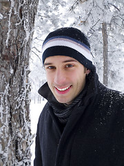 Image showing Smiling man in winter park