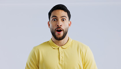 Image showing Portrait, man and surprise with announcement, wow and expression on a white studio background. Face, person and model with emoji, shocked and omg with news, gossip and reaction with mockup space