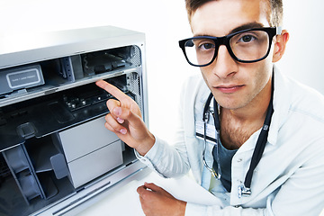 Image showing Computer technician, man and pointing at tech hardware, electronics or machine internal problem, fail or risk. Appliance maintenance, serious studio portrait or IT support gesture on white background