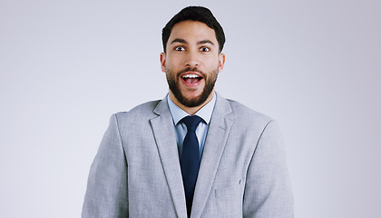 Image showing Business, man or portrait with surprised in studio for target, payment or bonus opportunity on gray background. Professional, person or employee and wow for announcement or promotion on mock up space