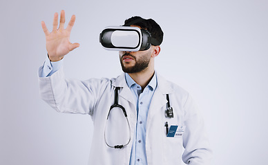 Image showing Doctor, VR vision and glasses for medical software, metaverse, futuristic technology and digital experience in studio. Healthcare man with 3d screen, hands and virtual reality on a white background
