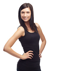 Image showing Happy woman, portrait and confidence in fashion, style or clothing isolated against a white studio background. Face of attractive young female person or model smile and posing with hands on hips