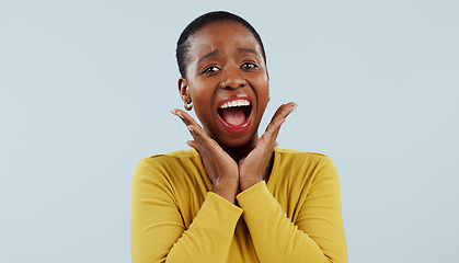 Image showing Happy black woman, portrait and face in surprise for winning, prize or celebration against a studio background. Excited African female person in wow, shock or bonus promotion on sale discount or deal